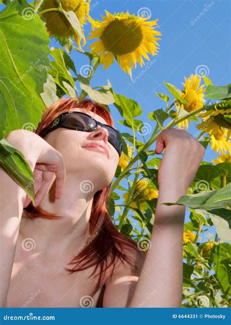 Red Hair Girl Enjoys Sun Sitting Under Sunflowers Stock Image Image