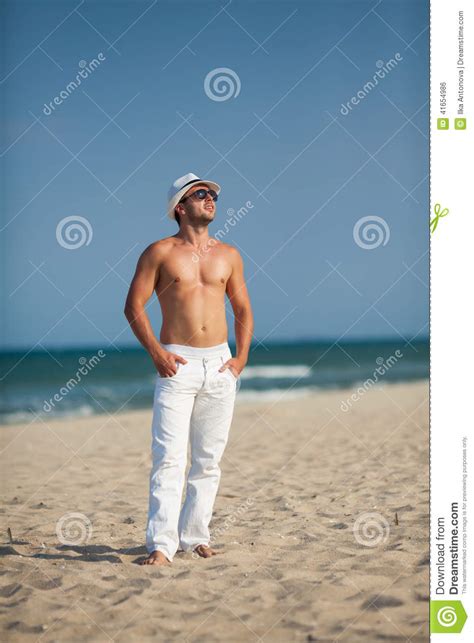 Portrait Of Man Standing On The Beach Stock Photo Image Of Freshness