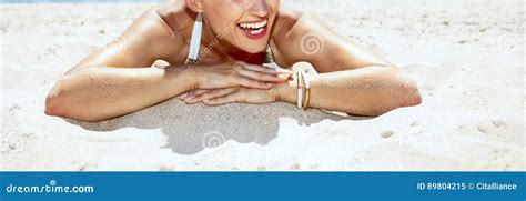 Smiling Woman In Swimsuit And Pineapple Glasses Laying On Beach Stock Image Image Of Distance