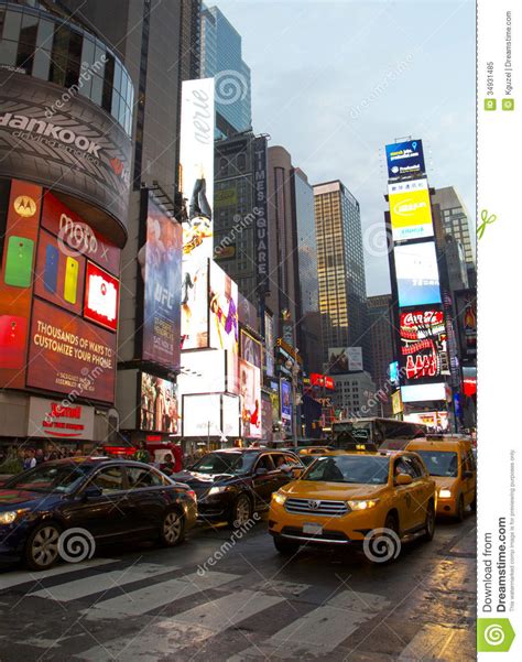Times Square With Animated Led Signs And Yellow Cabs Is