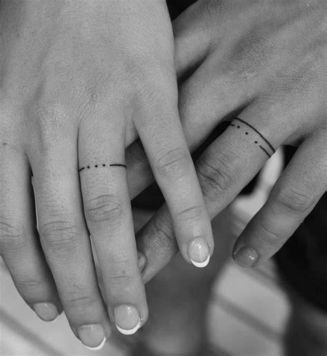 40 Best Wedding Ring Tattoos Love Symbols To Inspire You Ring Tattoos Dot Tattoos Matching