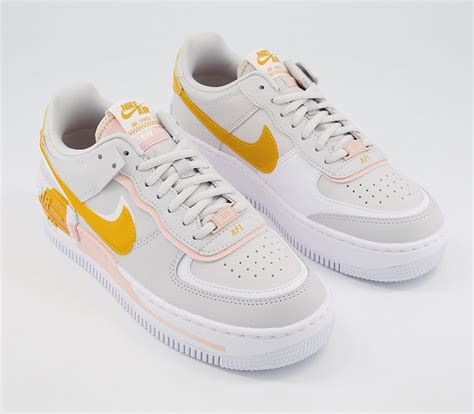 Delivery and processing speeds vary by pricing options. Nike Air Force 1 Shadow Trainers Vast Grey Pollen Rise ...
