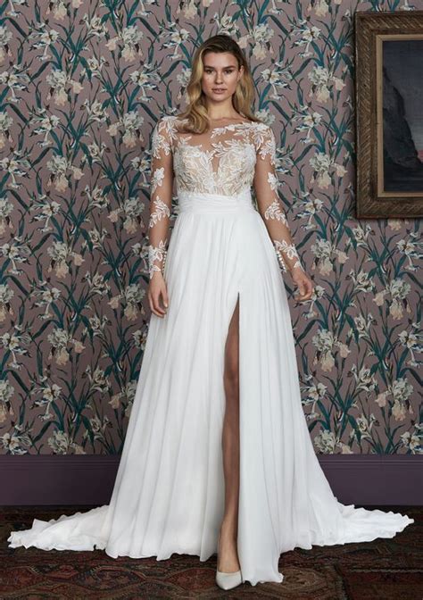 Asymmetrical wedding dress with long sleeves. Style ADDERLEY: Long Sleeve A-Line Gown with Asymmetrical ...