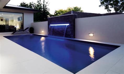 wow reflection style fiberglass pool with very large sheer descent water feature luxury