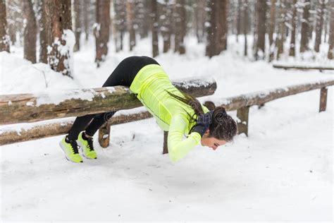 Fit Woman Doing Back Extension Exercise Outdoors In Woods Female