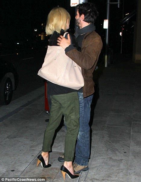 Charlize Theron And Keanu Reeves Go All Camera Shy After Being Caught