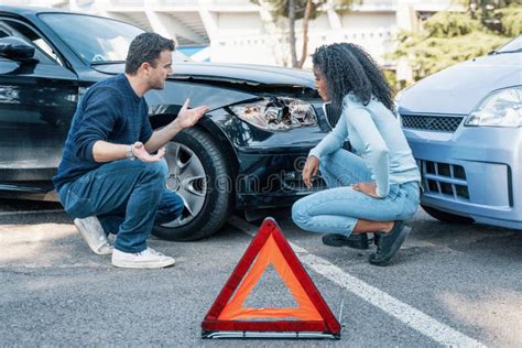 Two People Arguing After A Car Crash Accident Stock Image Image Of