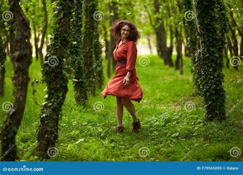 candid of a mature curly hair redhead woman stock image image of female curls 279565059