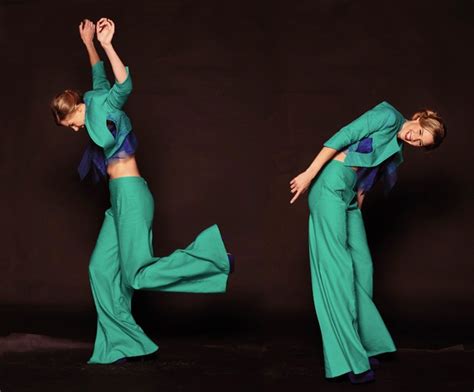 High Fashion Studio Photography With Movement On Black Background By