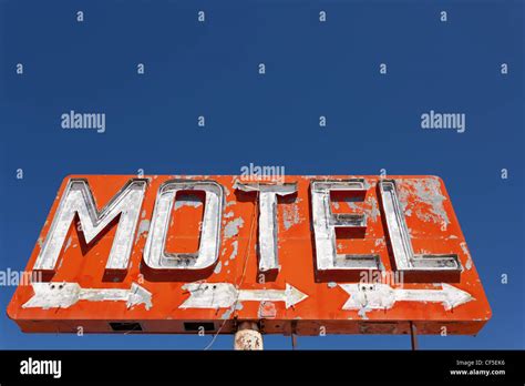 Red Vintage Neon Motel Sign On Blue Sky Stock Photo Alamy