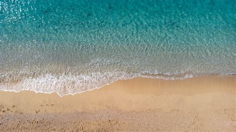 Aerial View Of Beautiful Sandy Beach And Soft Turquoise Ocean Wave