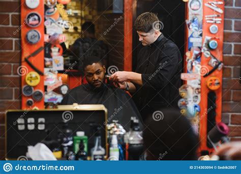 Visiting Barbershop African American Man In A Stylish Barber Shop