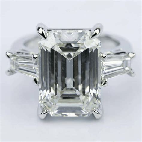 With delicate baguettes cascading down as they brilliantly frame the center stone making this ring is a classic beauty. Baguette Diamond Ring Buying Guide - Brilliance