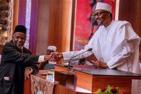 photos president buhari swears in acting chief justice of nigeria ibrahim tanko mohammed to
