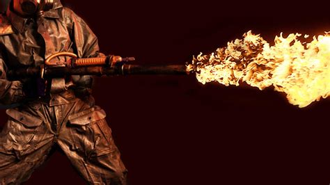 Video Man Burns A Zombie Hoard With Homemade Cornstarch Flamethrower