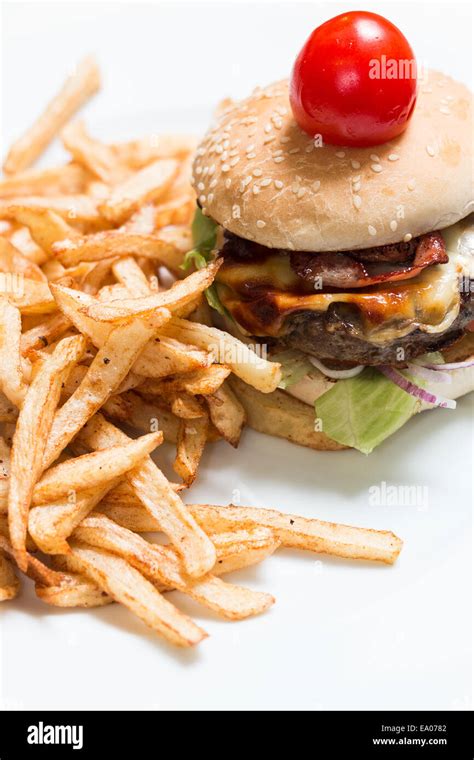 Both Eating Burger And French Fries Hi Res Stock Photography And Images