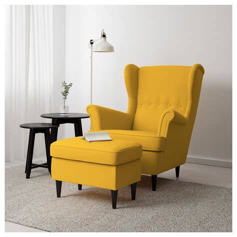The chair frame is made of solid wood, which is a durable natural material. STRANDMON Skiftebo yellow, Footstool - IKEA | Comfy chairs ...