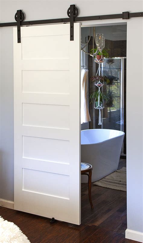 Barn style doors will create a focal point to any interior. 5 Panel Shaker Style Door (Primed) - Door to Door