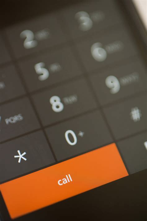 Free Stock Photo 10816 Orange Call Dial Button On A Touch Screen Phone