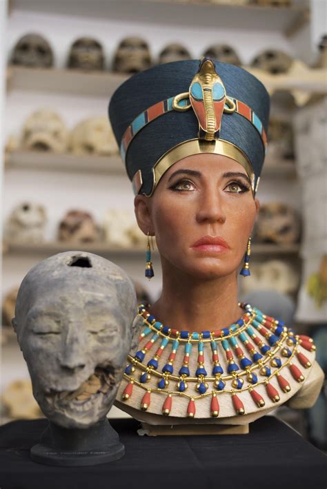 The Facial Reconstruction Of The “younger Lady” Mummy Next To A 3d Replica Of Its Head Created