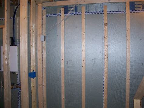 Remodeled basement from 70's paneling and suspended ceiling. Breneman Basement Makeover: Furring Strips Up and a start ...