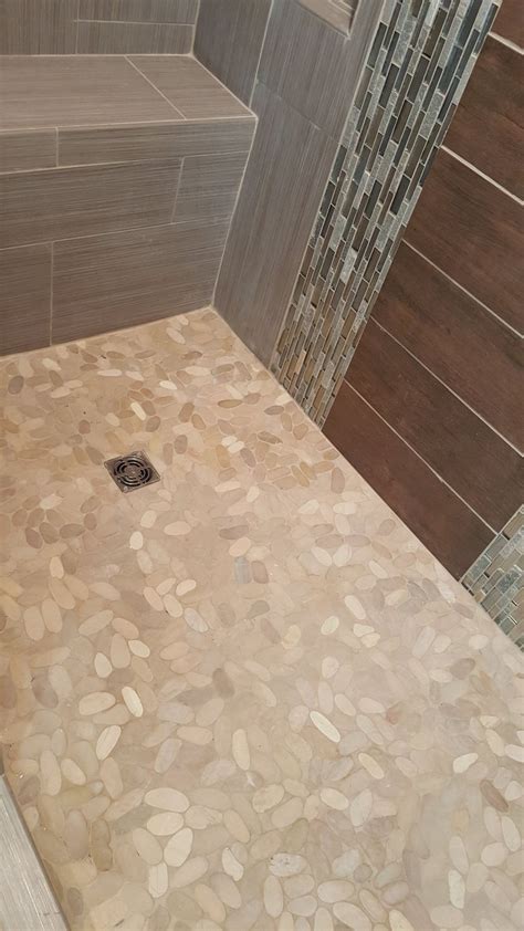 Cutom tile shower with pebble shower pan | Shower tile, Pebble shower, Shower pan