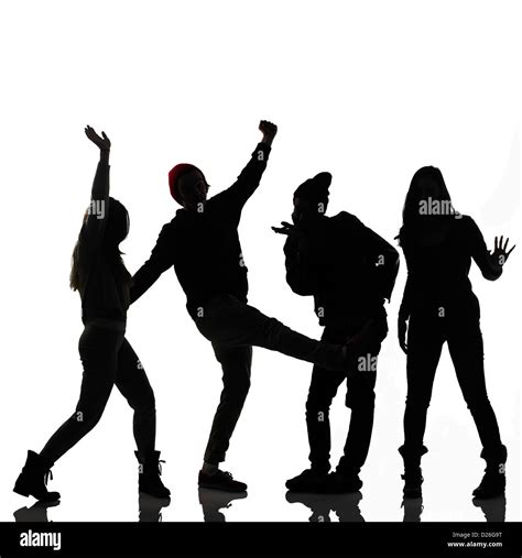 Silhouette Of A Group Of Teens Playing Around Stock Photo Alamy