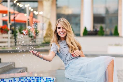 Free Photo Pretty Blonde Girl In Blue Tulle Skirt Having Fun On Terrace Background She
