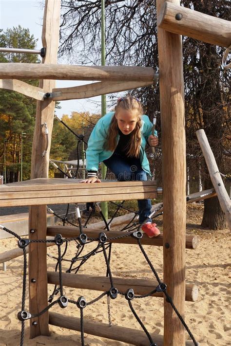 Child Girl Climbing Rope Playground In The Park Stock Image Image Of