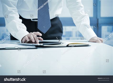 Businessman Using Digital Tablet In Office Stock Photo 334216229