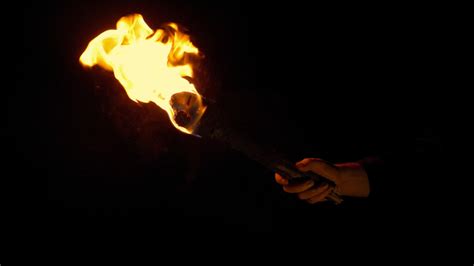 Burning Torch Is Held Up Then Goes Off Stock Footage Videohive