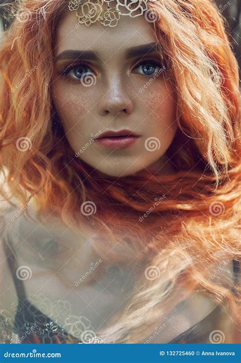 Beautiful Redhead Norwegian Girl With Big Eyes And Freckles On Face In The Forest Portrait Of