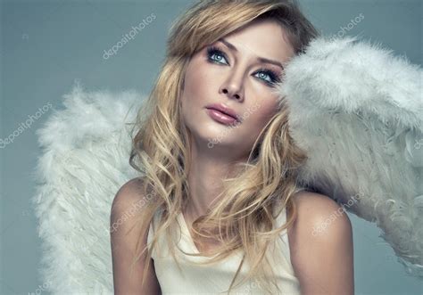 Beautiful Blonde Angel Stock Photo By ©kiuikson 22640649