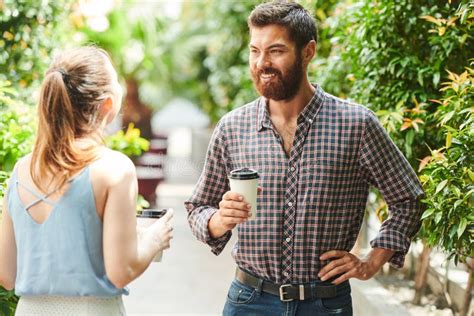 Smiling Man Talking To Friend Outdoors Stock Photo Image Of Drink