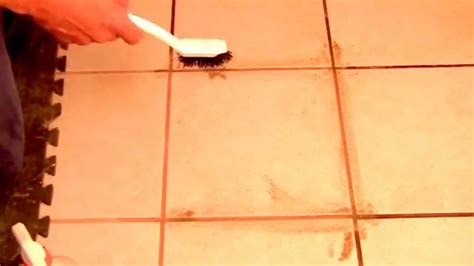 Use a soft brush to scrub grout lines and stains on the tile surfaces. How to Clean Grout From Tile Using Vinegar - YouTube