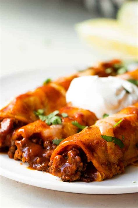 Remove the top layer of plastic wrap, invert beef mixture onto prepared baking sheet, and remove the bottom layer of plastic wrap. Authentic Beef Enchiladas - House of Yumm