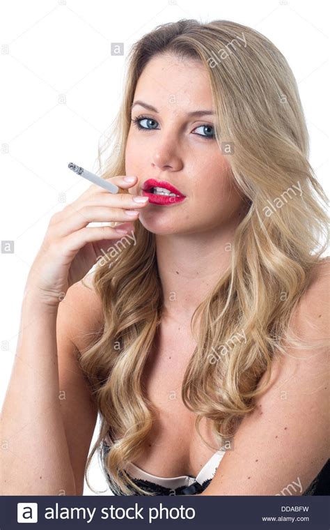 Confident Positive Young Woman Holding And Smoking A