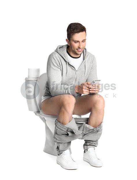 Man With Smartphone Sitting On Toilet Bowl White Background Stock Photo Download On Africa