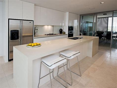Cottage modern kitchen island designs typically have open hand painted cabinets. Modern island kitchen design using slate - Kitchen Photo ...