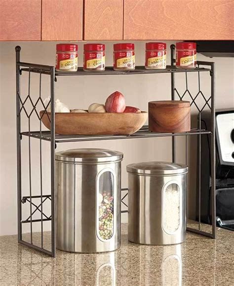 This secret storage space is easy to access and blends seamlessly into baseboards. BRONZE 2-TIER SHELF KITCHEN COUNTER SPACE SAVER CABINET ...