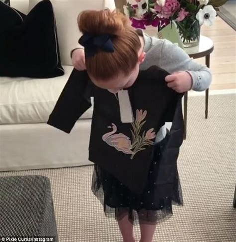 Roxy Jacenkos Daughter Pixie Curtis Opens More Presents Daily Mail Online