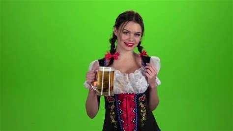 Girl Oktoberfest Sexually Attracts And Licks His Lips Green Screen Stock Footage