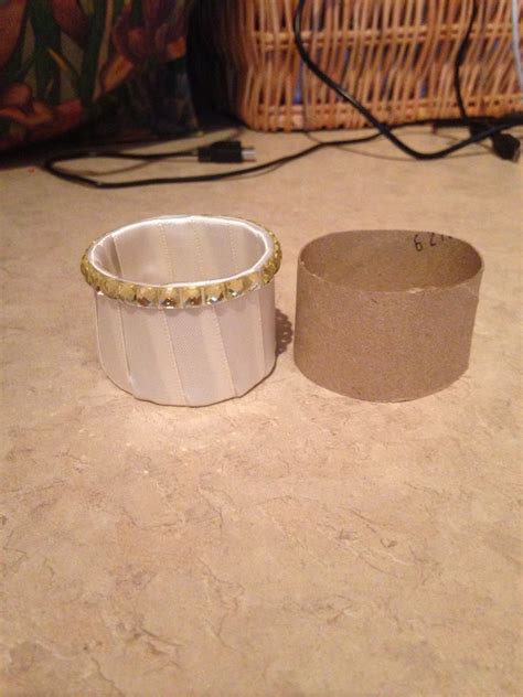 Napkin Ring Made From A Toilet Paper Roll Ribbon And Gold Trim
