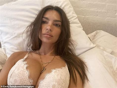Emily Ratajkowski Bares Cleavage In Lacy White Bra As She Takes Sultry
