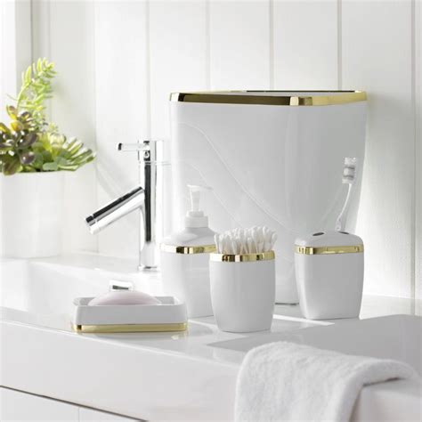 The simplest way to tie your bathroom together is to invest in a bathroom accessory set. Wayfair Basics 5 Piece Bathroom Accessory Set | Bathroom ...