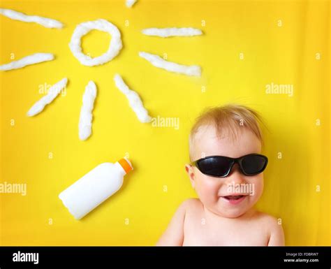Little Boy With Sunglasses And Sun Shape Stock Photo Alamy