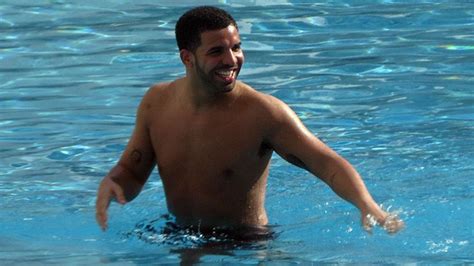 Watch Shirtless Drake Hang Out And Drink With Mystery Woman At Hotel