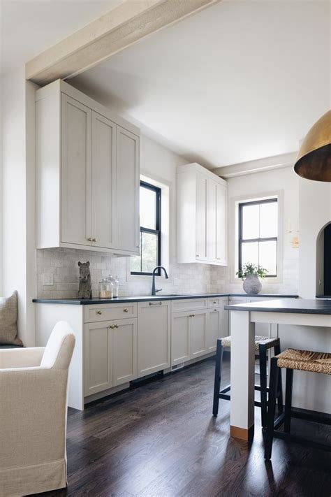 Refresh the look of your kitchen cabinets by simply giving them a fresh coat of paint. Kitchen Cabinet Paint Color: Benjamin Moore Revere Pewter. in 2021 | Modern farmhouse design ...