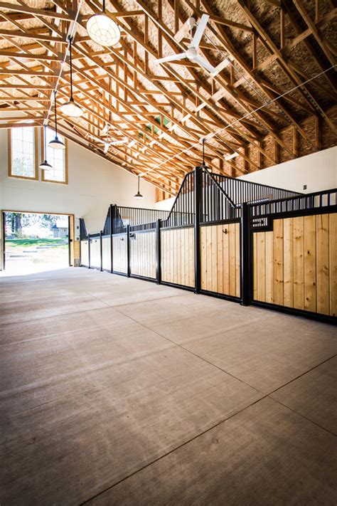 Position the fan blades to pull air up from the stalls. Stable Style: Impressive 3 Stall Barn | Horses & Heels
