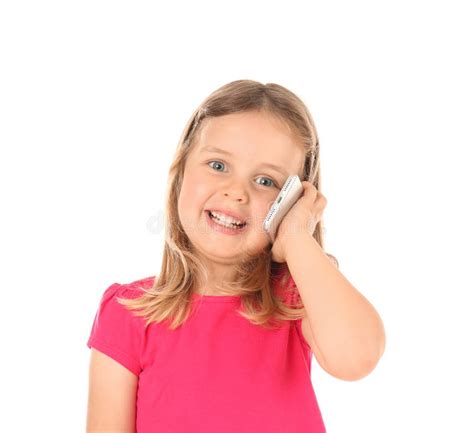 Cute Little Girl Talking On Mobile Phone Against White Background Stock